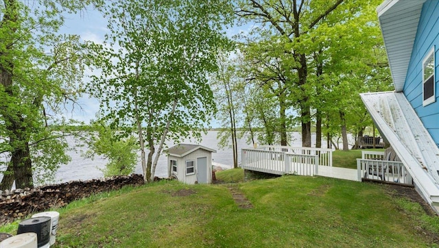 19157 181st Ave, Long Prairie, MN 56347 - view of green lawn featuring a deck with water view