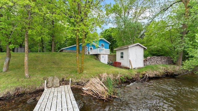 19157 181st Ave, Long Prairie, MN 56347 - view of green lawn featuring a dock and a water view