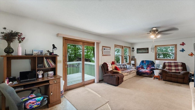 19157 181st Ave, Long Prairie, MN 56347 - living room with carpet flooring, a ceiling fan, an AC wall unit, and an office area