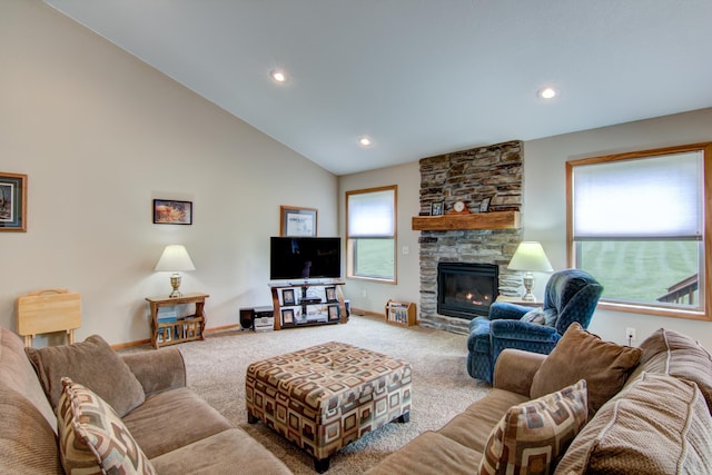 N5024 558th St, Menomonie, WI 54751 - carpeted living room featuring a stone fireplace, recessed lighting, baseboards, and vaulted ceiling