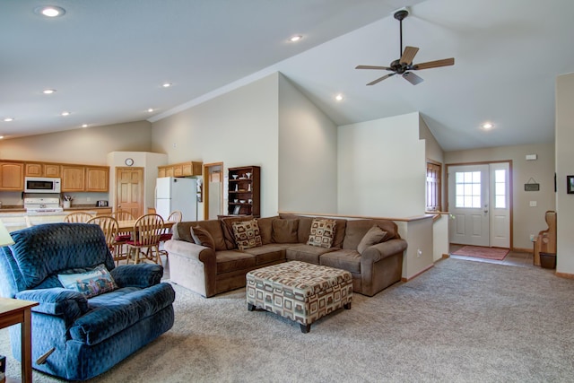 N5024 558th St, Menomonie, WI 54751 - living area with vaulted ceiling, light carpet, ceiling fan, baseboards, and recessed lighting