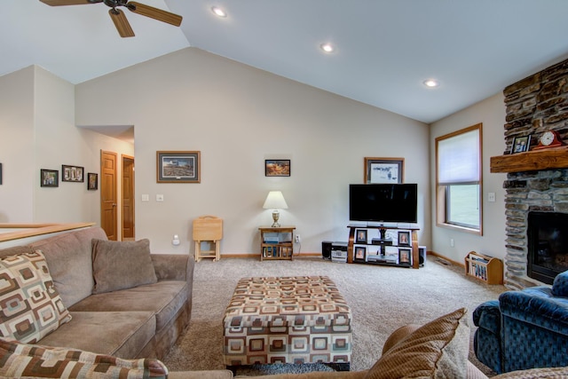 N5024 558th St, Menomonie, WI 54751 - carpeted living area with a ceiling fan, lofted ceiling, a stone fireplace, recessed lighting, and baseboards
