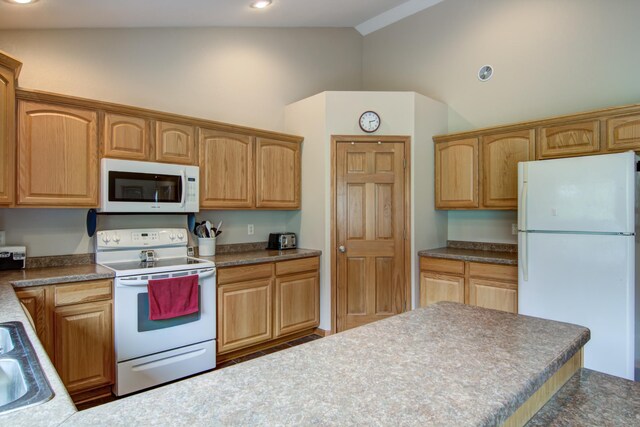 N5024 558th St, Menomonie, WI 54751 - kitchen with white appliances, high vaulted ceiling, a sink, dark countertops, and recessed lighting