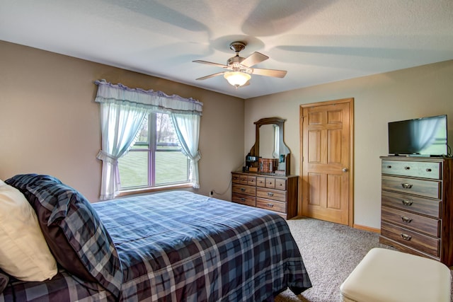 N5024 558th St, Menomonie, WI 54751 - carpeted bedroom with a ceiling fan