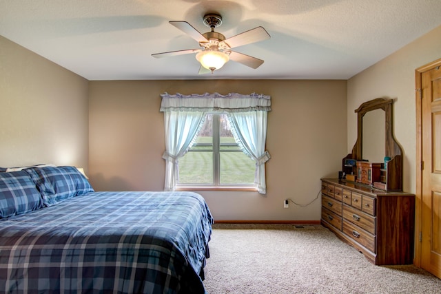 N5024 558th St, Menomonie, WI 54751 - bedroom with light colored carpet, baseboards, and ceiling fan