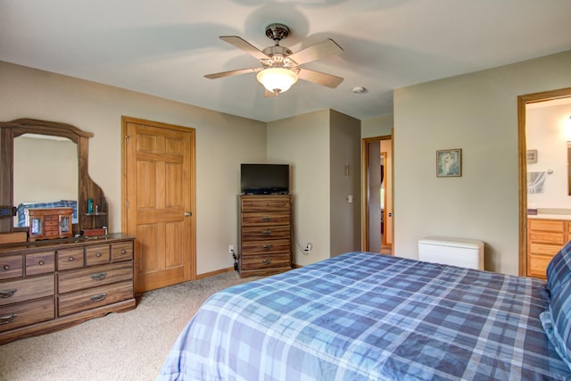 N5024 558th St, Menomonie, WI 54751 - bedroom featuring carpet floors, ceiling fan, ensuite bath, and baseboards