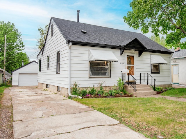 2159 Nortonia Ave, Saint Paul, MN 55119 - bungalow with roof with shingles, an outdoor structure, a detached garage, and a front lawn