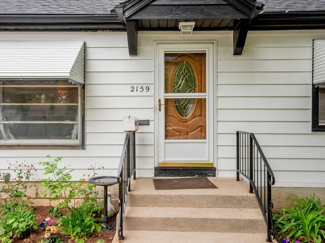 2159 Nortonia Ave, Saint Paul, MN 55119 - property entrance with a shingled roof