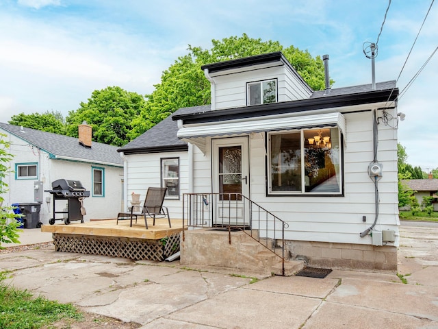 2159 Nortonia Ave, Saint Paul, MN 55119 - view of front of house featuring a wooden deck and roof with shingles
