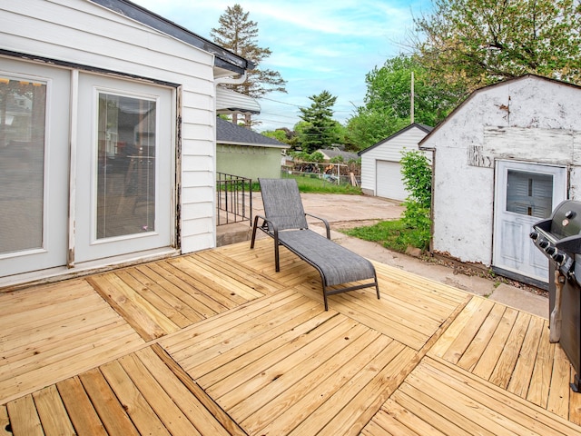 2159 Nortonia Ave, Saint Paul, MN 55119 - wooden deck with an outdoor structure and area for grilling