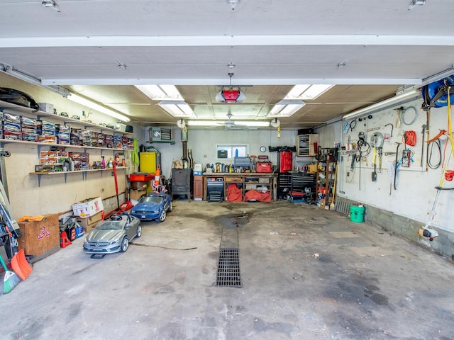 2159 Nortonia Ave, Saint Paul, MN 55119 - garage with a garage door opener and a workshop area