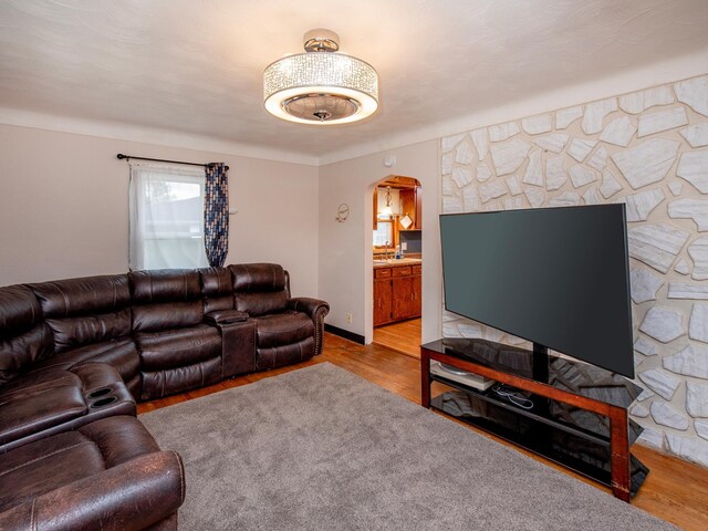2159 Nortonia Ave, Saint Paul, MN 55119 - living room with arched walkways, wood finished floors, and baseboards