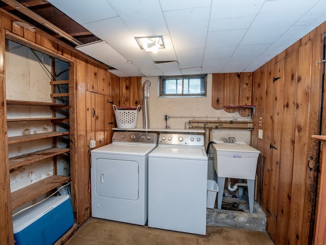2159 Nortonia Ave, Saint Paul, MN 55119 - washroom featuring wooden walls and independent washer and dryer