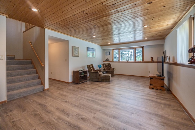 sitting room featuring wood ceiling, wood finished floors, stairway, recessed lighting, and baseboards