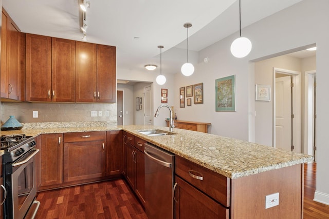100 3rd Ave S Unit 1107, Minneapolis, MN 55401 - kitchen featuring stainless steel appliances, a sink, a peninsula, dark wood finished floors, and light stone counters