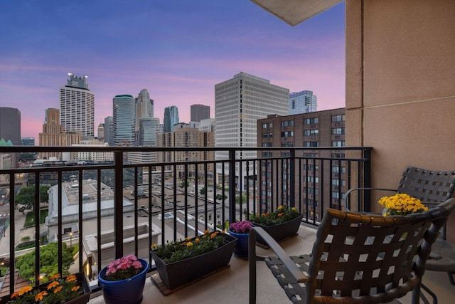 100 3rd Ave S Unit 1107, Minneapolis, MN 55401 - balcony at dusk featuring a skyline view