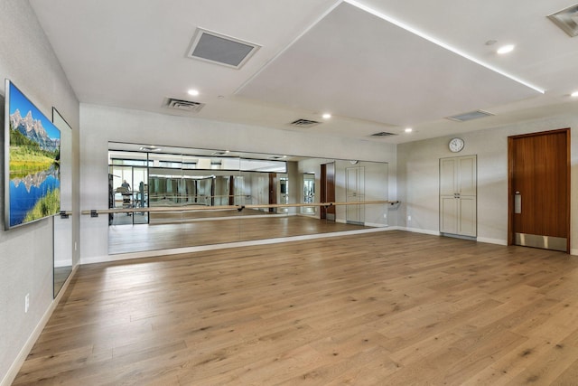 100 3rd Ave S Unit 1107, Minneapolis, MN 55401 - workout area with wood finished floors, baseboards, and recessed lighting