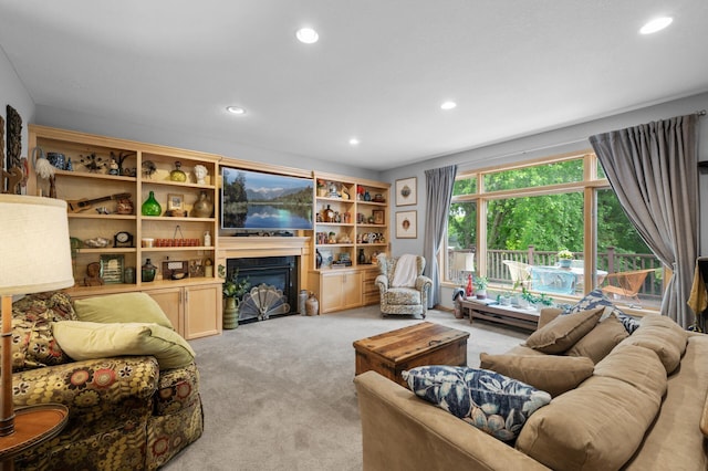 1665 3rd St SW, New Brighton, MN 55112 - living area with light carpet, recessed lighting, and a glass covered fireplace