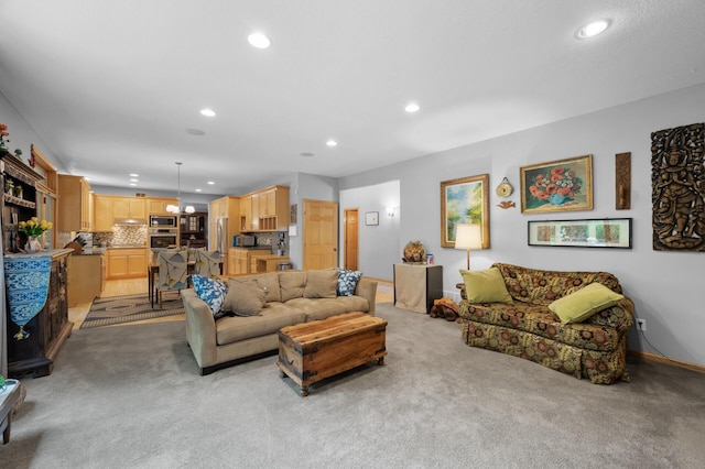 1665 3rd St SW, New Brighton, MN 55112 - living room featuring recessed lighting, light colored carpet, and baseboards