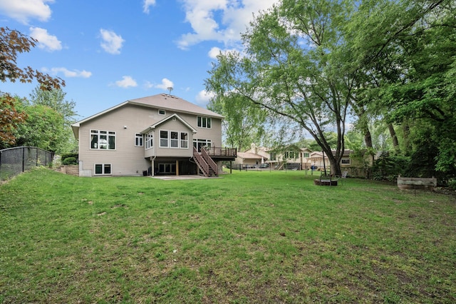 1665 3rd St SW, New Brighton, MN 55112 - back of property with stairs and a wooden deck