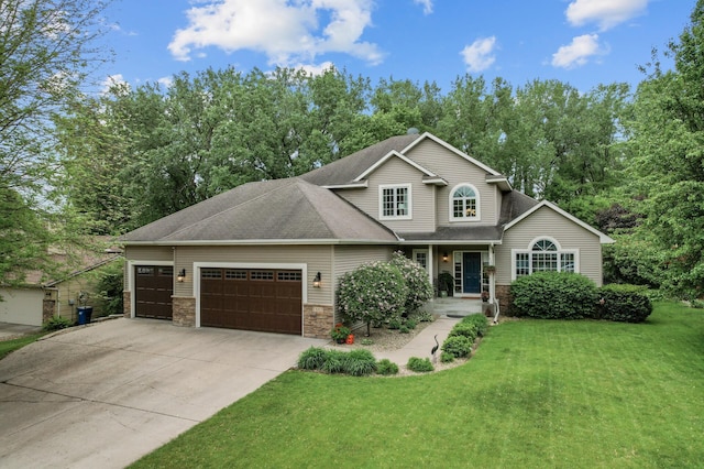 1665 3rd St SW, New Brighton, MN 55112 - view of front facade featuring an attached garage, driveway, a front yard, and a shingled roof