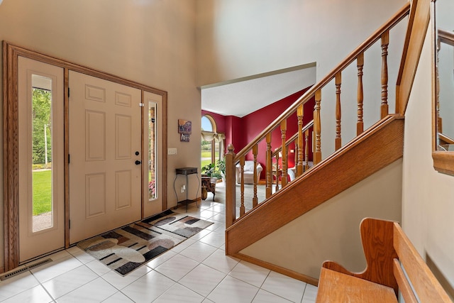 2501 112th St, Bloomington, MN 55431 - entrance foyer with a high ceiling, stairs, and tile patterned flooring