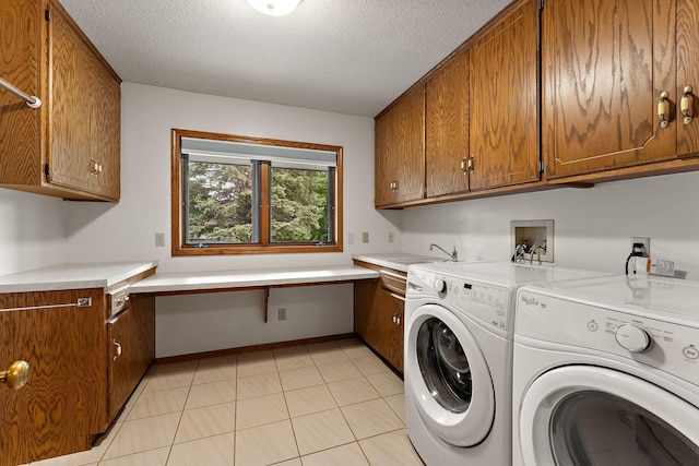 2501 112th St, Bloomington, MN 55431 - washroom featuring cabinet space, independent washer and dryer, a textured ceiling, and light tile patterned floors