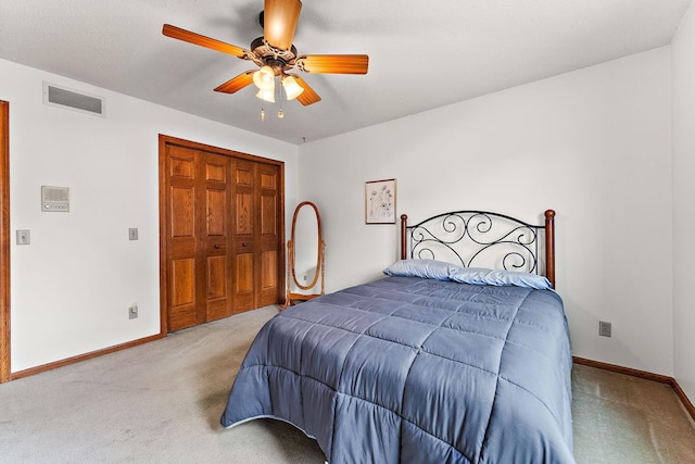 2501 112th St, Bloomington, MN 55431 - bedroom with carpet flooring, baseboards, ceiling fan, and a closet