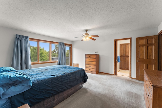 2501 112th St, Bloomington, MN 55431 - bedroom featuring light carpet, a textured ceiling, baseboards, and ceiling fan