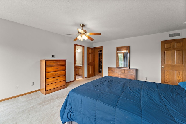 2501 112th St, Bloomington, MN 55431 - bedroom featuring light colored carpet, baseboards, ensuite bathroom, ceiling fan, and a spacious closet