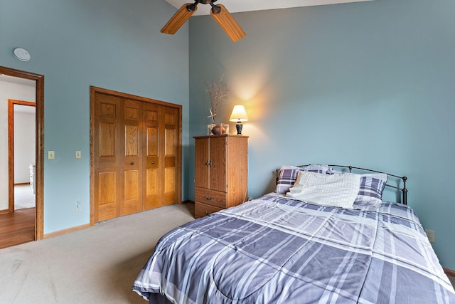 2501 112th St, Bloomington, MN 55431 - carpeted bedroom featuring a high ceiling, a closet, baseboards, and ceiling fan