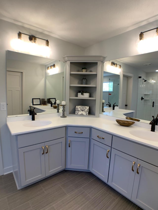 4605 130th Ln NE, Blaine, MN 55449 - bathroom featuring a stall shower and double vanity