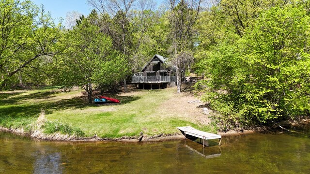 23873 Arcade Loop, Crow Wing Lake Twp, MN 56464 - back of house with a deck with water view