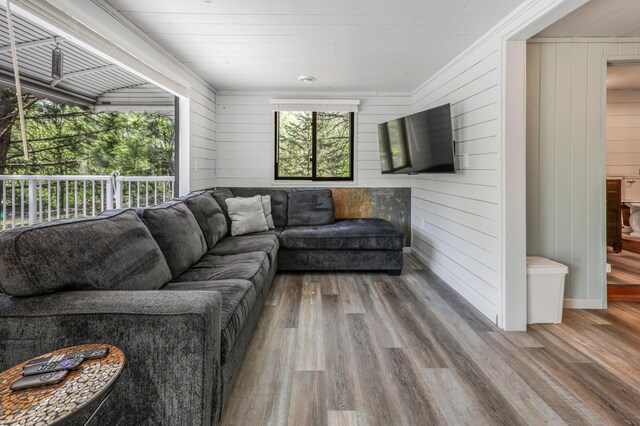 23873 Arcade Loop, Crow Wing Lake Twp, MN 56464 - living area with wooden walls and wood finished floors
