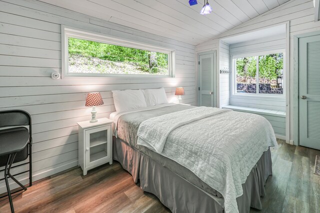 23873 Arcade Loop, Crow Wing Lake Twp, MN 56464 - bedroom featuring vaulted ceiling, wooden walls, wood finished floors, and wooden ceiling