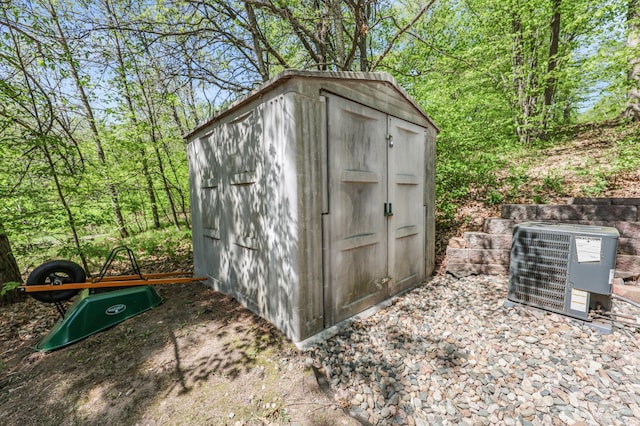 23873 Arcade Loop, Crow Wing Lake Twp, MN 56464 - view of shed featuring central air condition unit