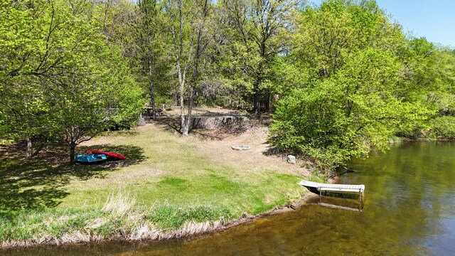 23873 Arcade Loop, Crow Wing Lake Twp, MN 56464 - view of yard with a boat dock