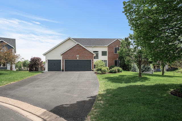 2940 Tiflawn Ct, Shakopee, MN 55379 - traditional-style house with asphalt driveway, brick siding, a garage, and a front lawn