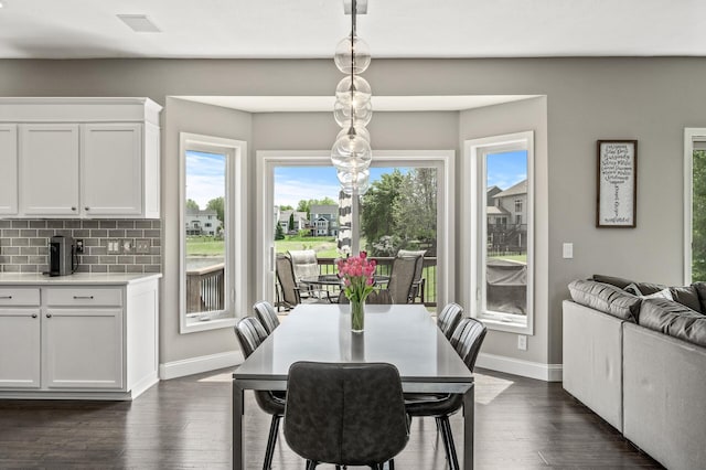 2940 Tiflawn Ct, Shakopee, MN 55379 - dining room with dark wood finished floors and baseboards
