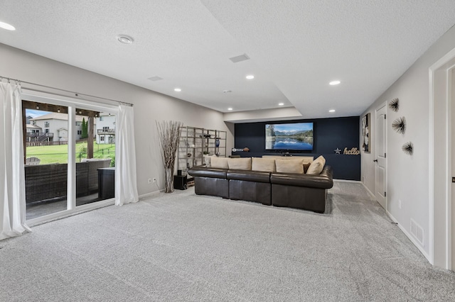 2940 Tiflawn Ct, Shakopee, MN 55379 - carpeted living area featuring a textured ceiling, baseboards, and recessed lighting