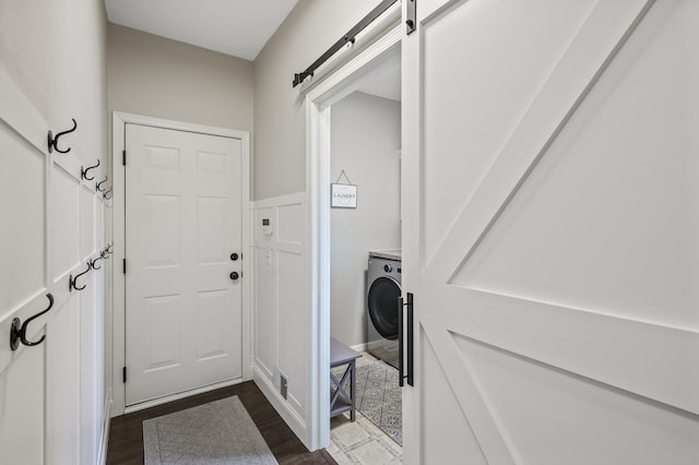 2940 Tiflawn Ct, Shakopee, MN 55379 - laundry room with washer / clothes dryer and dark wood-type flooring