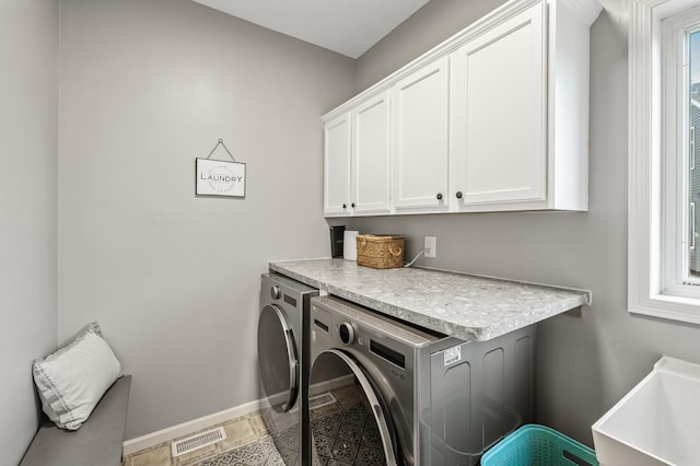 2940 Tiflawn Ct, Shakopee, MN 55379 - clothes washing area featuring cabinet space, separate washer and dryer, and baseboards