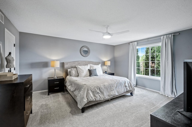 2940 Tiflawn Ct, Shakopee, MN 55379 - carpeted bedroom featuring a textured ceiling, baseboards, and a ceiling fan