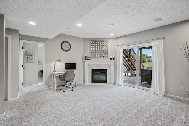 2940 Tiflawn Ct, Shakopee, MN 55379 - home office featuring carpet floors, a textured ceiling, baseboards, recessed lighting, and a fireplace with flush hearth