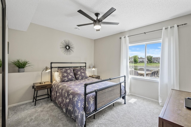 2940 Tiflawn Ct, Shakopee, MN 55379 - bedroom featuring carpet flooring, a textured ceiling, baseboards, and ceiling fan