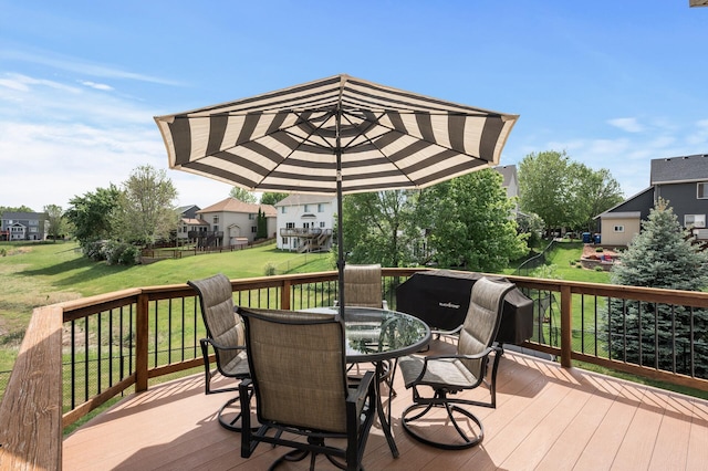 2940 Tiflawn Ct, Shakopee, MN 55379 - wooden terrace featuring outdoor dining area, a yard, and a residential view