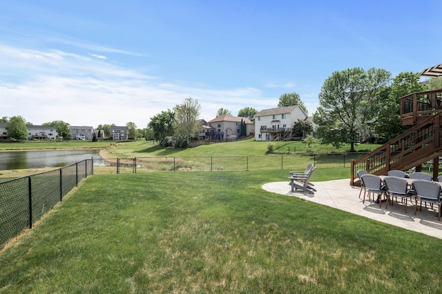 2940 Tiflawn Ct, Shakopee, MN 55379 - view of yard featuring a patio area, a water view, stairs, and a residential view