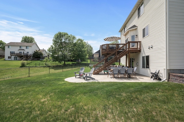 2940 Tiflawn Ct, Shakopee, MN 55379 - view of yard featuring stairway, a wooden deck, and a patio