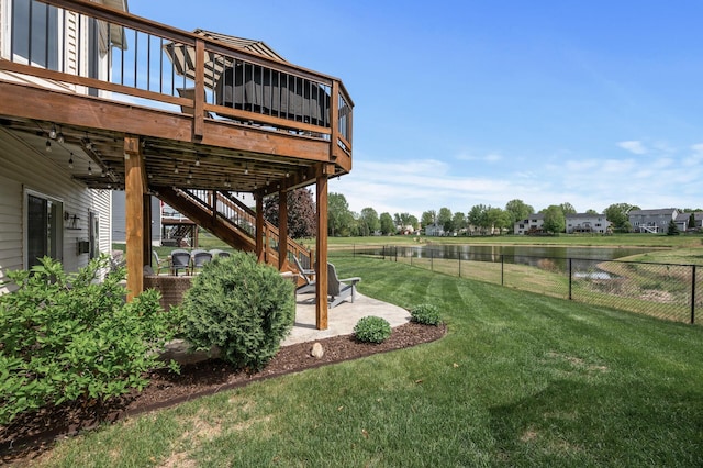 2940 Tiflawn Ct, Shakopee, MN 55379 - view of yard with a deck with water view, stairs, and a patio area