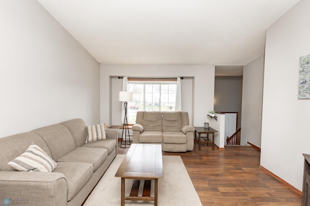 living area with dark wood-style flooring